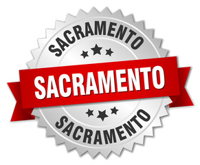 Sacramento  round silver badge with red ribbon
