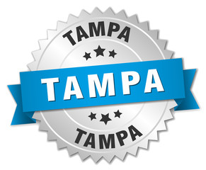 Tampa round silver badge with blue ribbon