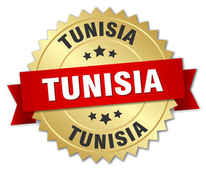 Tunisia round golden badge with red ribbon
