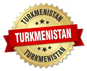 Obraz premium Turkmenistan round golden badge with red ribbon
