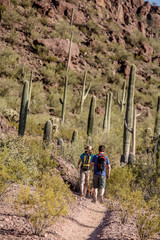 Desert Hikers in the Distance on Trail