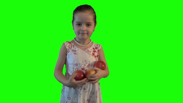 girl offers fruit advertises hromakey