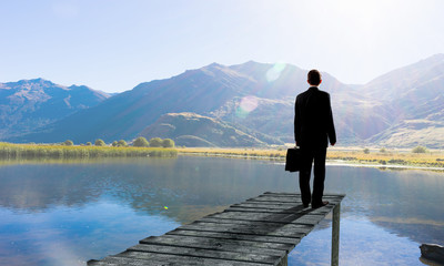 Businessman stand on berth