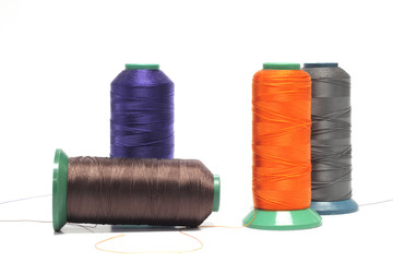 thread , brown, purple,orange, gray