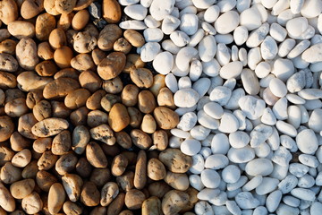 Two tone white and brown pebble stone background