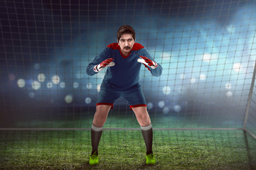 Goalkeeper in front of goalpost