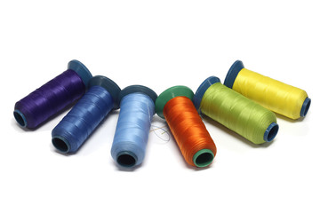 colorful bobbins isolated