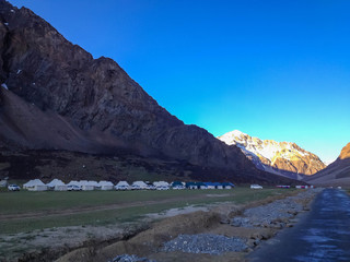 Fototapeta na wymiar Sarchu camping tents at Leh - Manali Highway. Leh - Manali Road is a highway in northern India connecting Leh in Ladakh in Jammu and Kashmir state and Manali in Himachal Pradesh state.