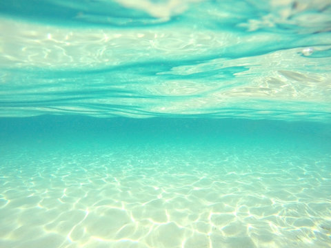 Fototapeta underwater background with sandy sea bottom