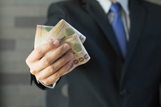 Businessman Holding Money Thai Baht