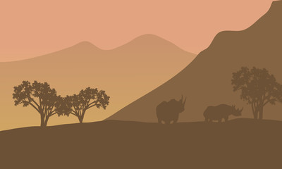Fototapeta na wymiar Rhino silhouette on the mountain
