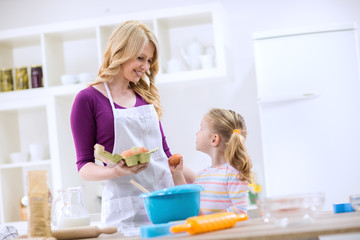 Family having fun in kitchen