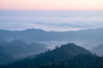 Mountain fog scenic sunrise morning at thongphaphum, kanchanaburi, thailand