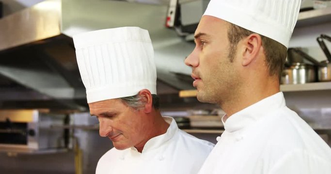 Three chefs discussing