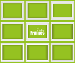 Set of white realistic frames with shadow isolated on the green wall. Vector illustration