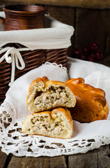 Pies stuffed meat on wooden background, ukrainian or russian cuisine. Selective focus