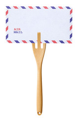 Mail letter on wooden fork isolated on white