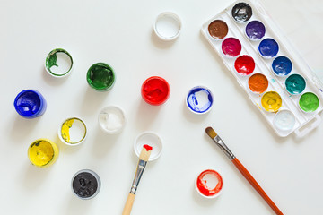 Art and Creation Concept Set of color Paints and wooden Brush