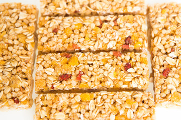 muesli bars with  dried fruit on isolated background