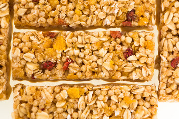 muesli bars with  dried fruit on isolated background
