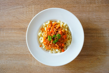 Fried macaroni with chicken . close soft focus