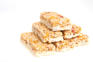muesli bars with  dried fruit on isolated background