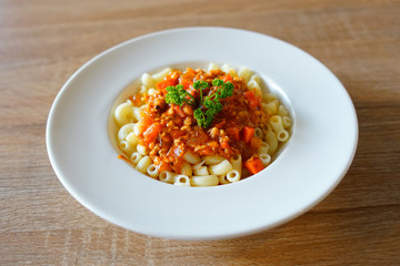 Fried macaroni with chicken . close soft focus