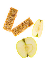 muesli bars dried fruit on isolated background with apple