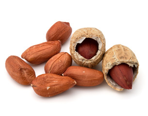 Opened and whole peanut or groundnut pod isolated on white backg
