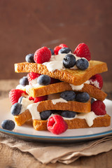 french toasts with creme fraiche and berries for breakfast