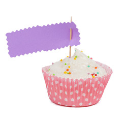 Pink cupcake with sprinkles with copy space to side isolated on