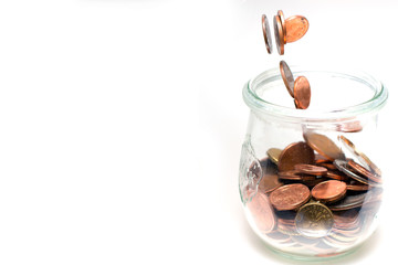 Fototapeta na wymiar coins in a jar savings