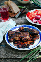 Healthy dinner - baked meat with vegetables in a rustic style.