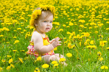 Fototapeta premium Happy little girl on the meadow