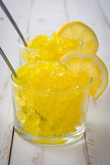 Lemon slushie on white wood
