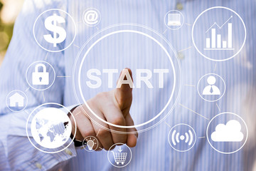 Businessman pushing online button start sign