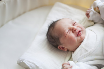 Newborn baby smiling