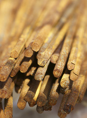 Rusty iron rods. Building.