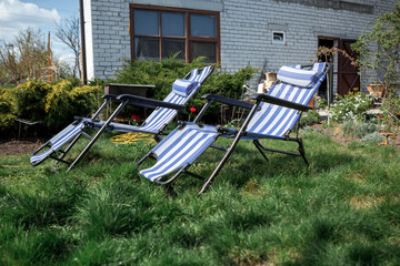 sun loungers and country house