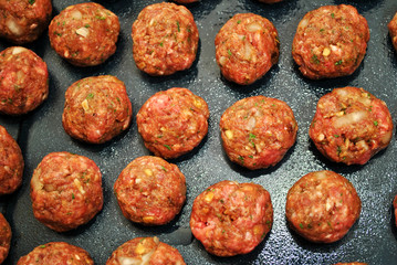 Many Raw Meatballs Ready to be Baked