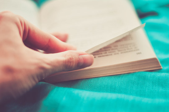 Female Hand, Flipping A Book (vintage)