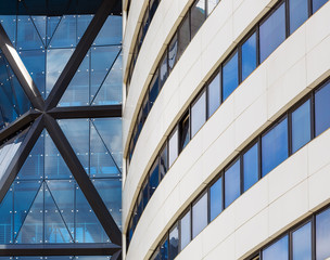 Abstract modern building. Close-up view of the modern building of steel and glass. Modern architecture.