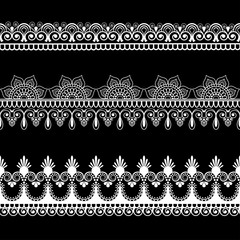 Border line lace mehndi elements in Indian style for card and tattoo isolated on black background.