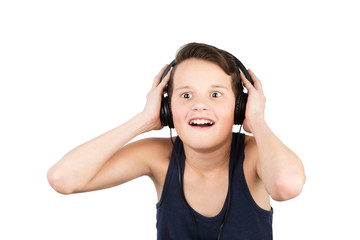 Naklejka premium Portrait of joyful and the surprised teenager boy in headphones