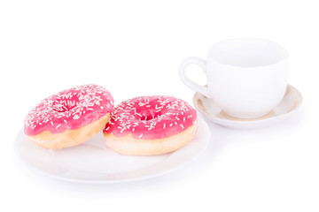Two donut on a plate with a cup