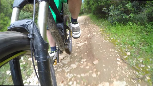 Low angle view of mountain biker riding bicycle