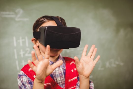 Boy using a virtual reality device