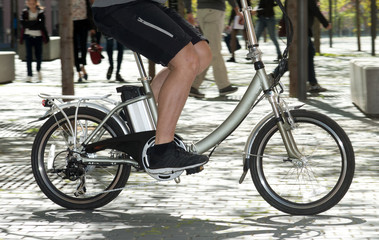 Bicycle electric running through the city