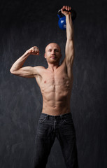 Fototapeta premium Exercise With Kettle Bell.