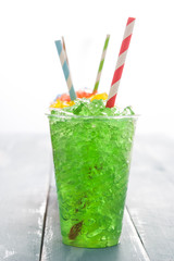 Colorful summer slushies on blue background
